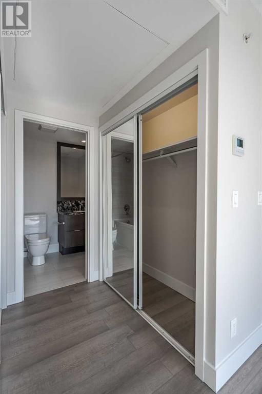 Ensuite bathroom with walk-trough closets on both sides | Image 20