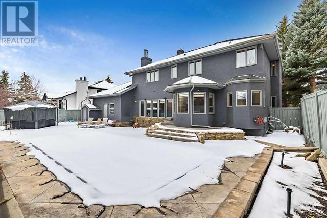 Backyard-Don't let the snow fool you! In the centre of photo is a beautiful heated inground pool | Image 46