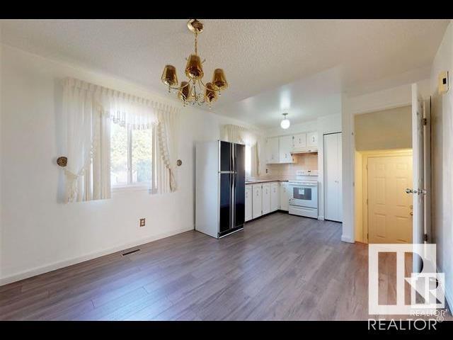 16214 109 St Nw, House attached with 3 bedrooms, 1 bathrooms and null parking in Edmonton AB | Image 3