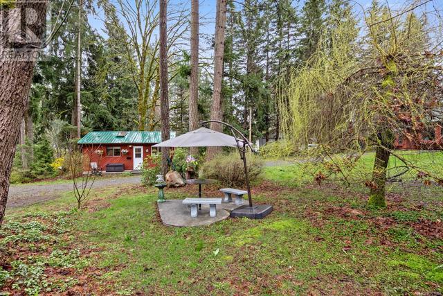 353 Powerhouse Rd, House detached with 4 bedrooms, 5 bathrooms and 10 parking in Comox Valley C (Puntledge   Black Creek) BC | Image 65