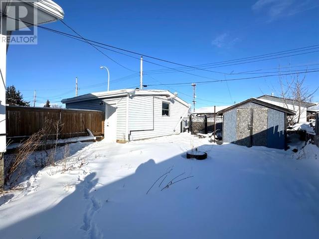 9239 107 Avenue, House detached with 4 bedrooms, 2 bathrooms and 4 parking in Grande Prairie AB | Image 39
