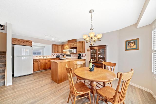 72 Kingsland Court Sw, Home with 3 bedrooms, 2 bathrooms and 2 parking in Calgary AB | Image 10