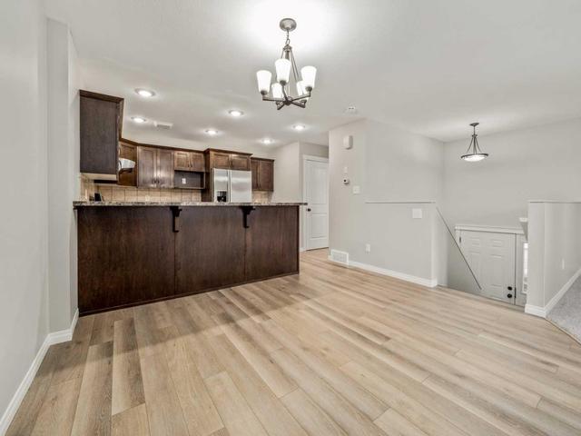 2 - 24 Cougar Cove N, Home with 3 bedrooms, 1 bathrooms and 1 parking in Lethbridge AB | Image 5