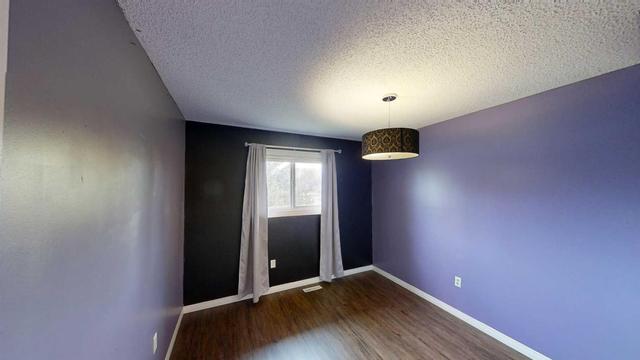 9813 73 Avenue, Home with 4 bedrooms, 2 bathrooms and null parking in Grande Prairie AB | Image 6