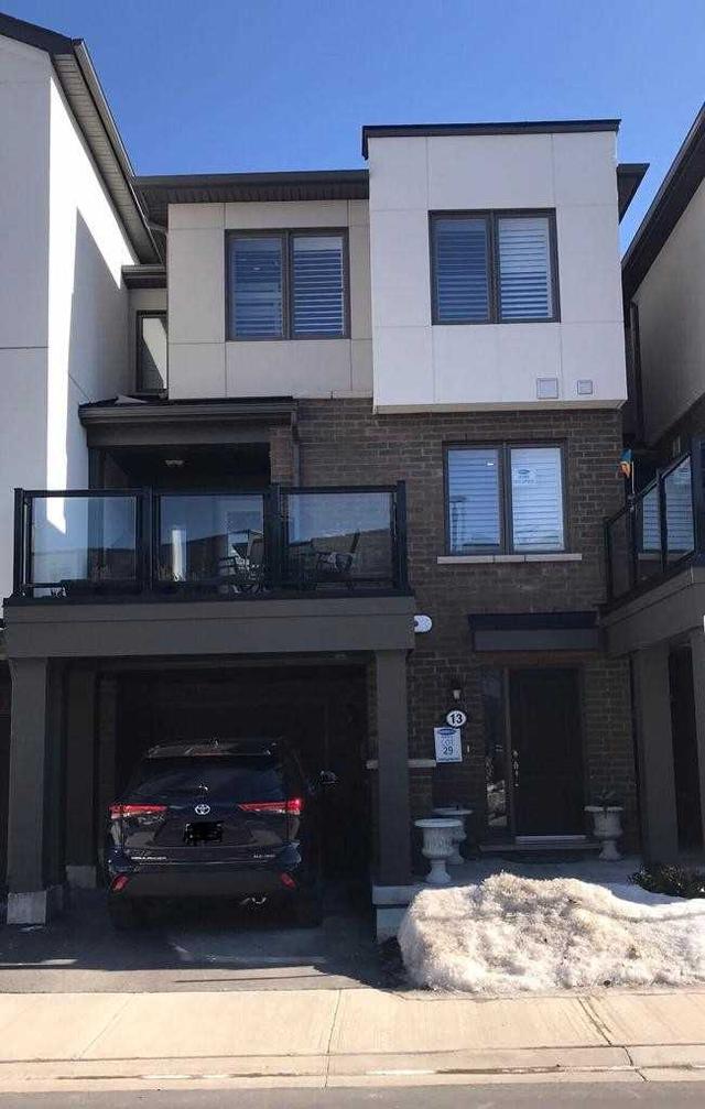 1125 Leger Way N, Townhouse with 3 bedrooms, 3 bathrooms and 2 parking in Milton ON | Image 2