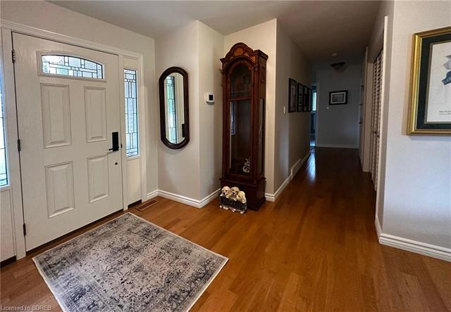 Large welcoming foyer with double closet and storage. | Image 45