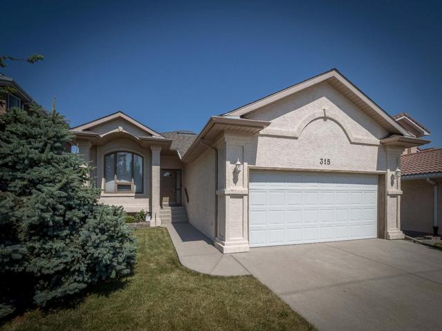 315 Edgebrook Rise Nw, House detached with 3 bedrooms, 3 bathrooms and 4 parking in Calgary AB | Image 8