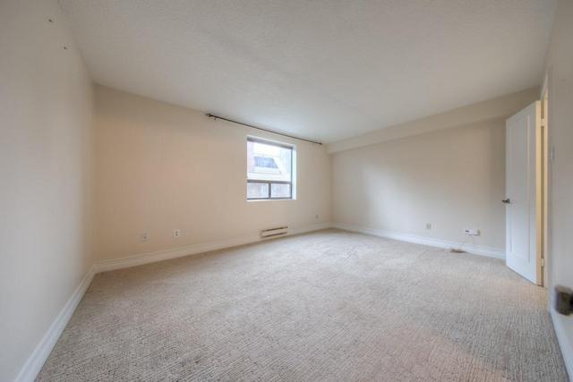 203 - 19 Dundonald St, Condo with 2 bedrooms, 2 bathrooms and 1 parking in Toronto ON | Image 8