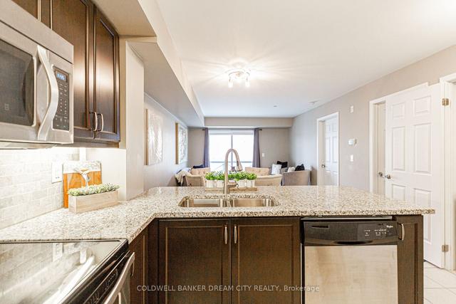 211 - 1045 Nadalin Hts, Condo with 1 bedrooms, 1 bathrooms and 2 parking in Milton ON | Image 5