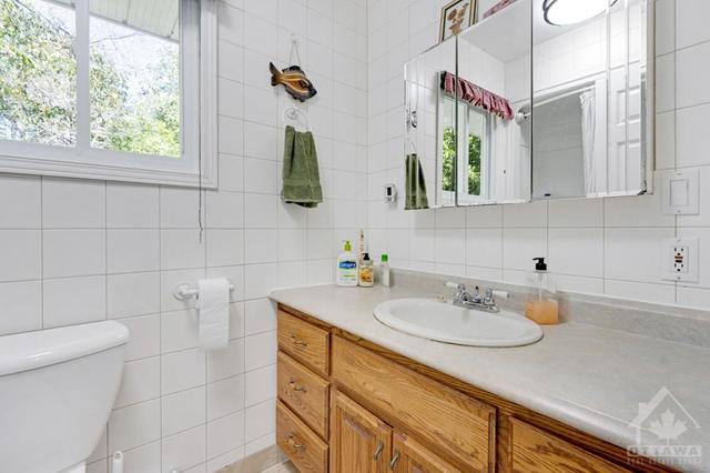 Combined laundry room and half-bathroom | Image 20