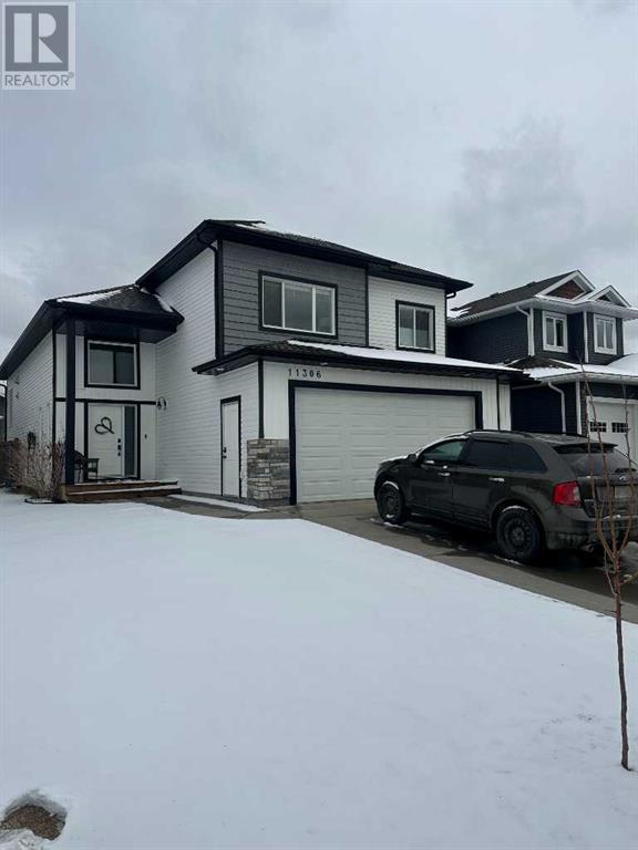 11306 59 Avenue, House detached with 3 bedrooms, 2 bathrooms and 4 parking in Grande Prairie AB | Image 1