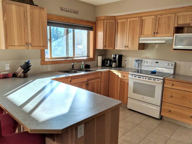 300 - 1140 Railway Ave, Condo with 1 bedrooms, 2 bathrooms and 1 parking in Canmore AB | Image 28