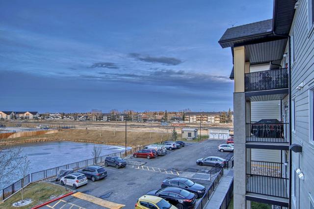 6304 - 304 Mackenzie Way Sw, Condo with 2 bedrooms, 1 bathrooms and 1 parking in Airdrie AB | Image 12