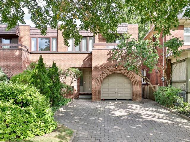 34 Castlefield Ave, House semidetached with 3 bedrooms, 4 bathrooms and 3 parking in Toronto ON | Image 1