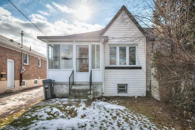 65 Manitoba St, House semidetached with 2 bedrooms, 2 bathrooms and 2 parking in Toronto ON | Image 1