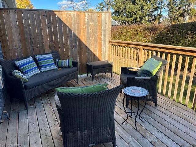 Back Deck with Privacy Hedge off Living Room | Image 5