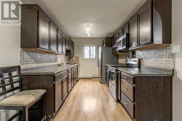 203, - 5015 51 Street, Condo with 2 bedrooms, 1 bathrooms and 1 parking in Taber AB | Image 18