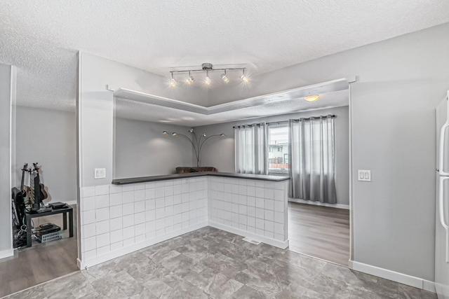 192 Penbrooke Close Se, House detached with 5 bedrooms, 2 bathrooms and 3 parking in Calgary AB | Image 3