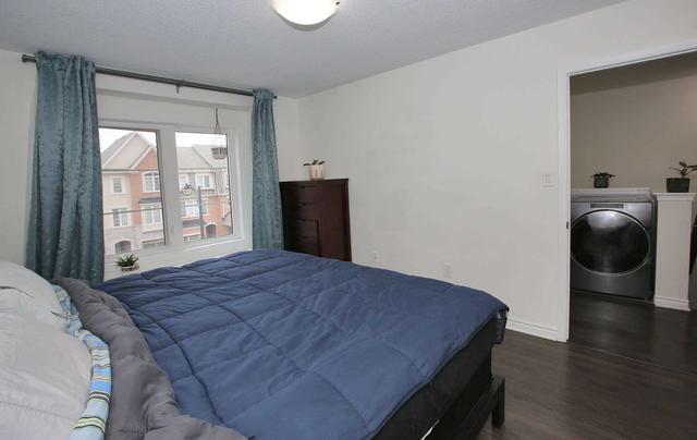 28 Fusilier Dr, House attached with 2 bedrooms, 3 bathrooms and 3 parking in Toronto ON | Image 11