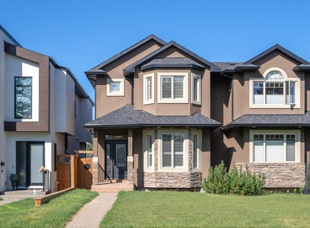 3327 40 Street Sw, Home with 4 bedrooms, 3 bathrooms and 2 parking in Calgary AB | Image 1