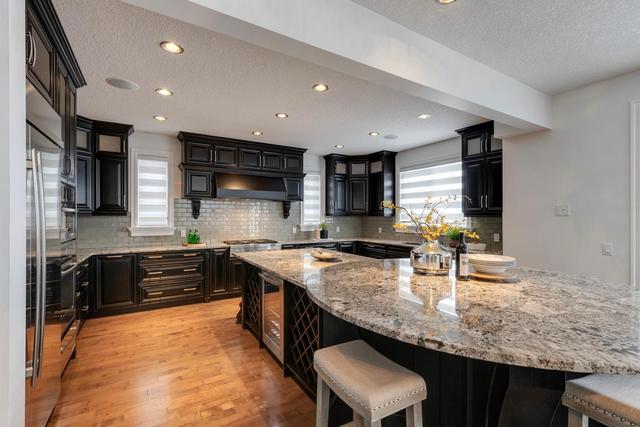 36 Aspen Ridge Manor Sw, Home with 6 bedrooms, 6 bathrooms and 6 parking in Calgary AB | Image 11