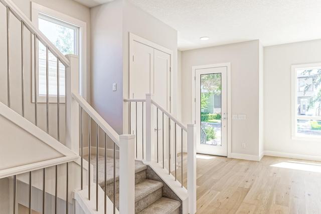 714 51 Avenue Sw, Home with 4 bedrooms, 3 bathrooms and 2 parking in Calgary AB | Image 3