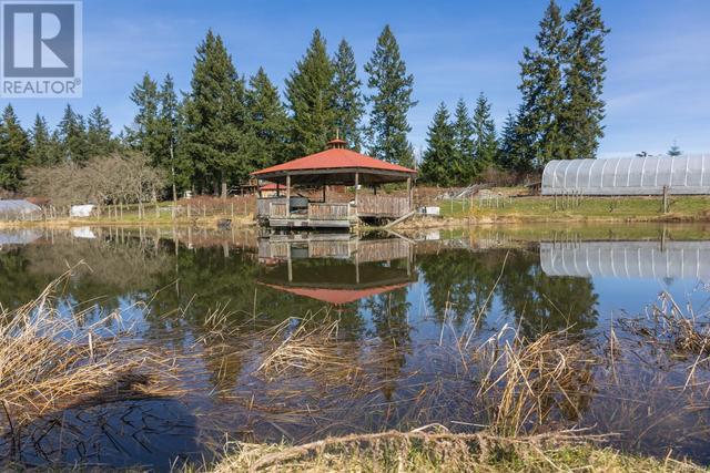 243 Cape Mudge Rd, House detached with 6 bedrooms, 4 bathrooms and 100 parking in Strathcona C BC | Image 71