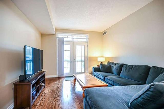 102 - 396 Plains Rd E, Condo with 2 bedrooms, 2 bathrooms and 1 parking in Burlington ON | Image 8