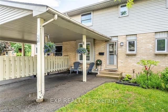 51 - 55 Ashley Cres, Townhouse with 3 bedrooms, 2 bathrooms and 2 parking in London ON | Image 1