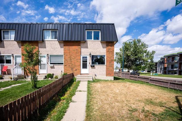 1402 Ashgrove Road S, Home with 2 bedrooms, 1 bathrooms and 2 parking in Lethbridge AB | Image 1