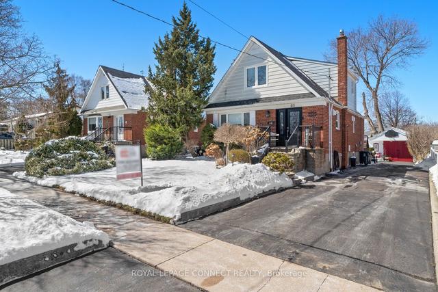 60 Fitzgibbon Ave, House detached with 5 bedrooms, 3 bathrooms and 7 parking in Toronto ON | Image 1