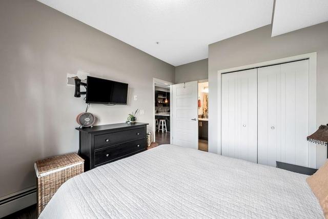 105 - 6603 New Brighton Avenue Se, Condo with 1 bedrooms, 1 bathrooms and 1 parking in Calgary AB | Image 12