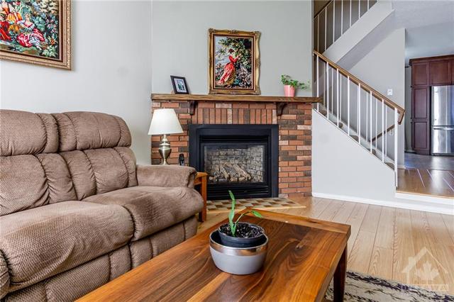 gas fireplace in living room | Image 4