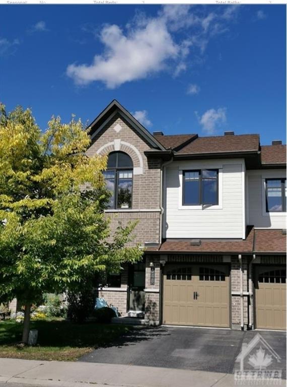 348 Tourmaline Crescent, Townhouse with 3 bedrooms, 3 bathrooms and 2 parking in Ottawa ON | Image 1