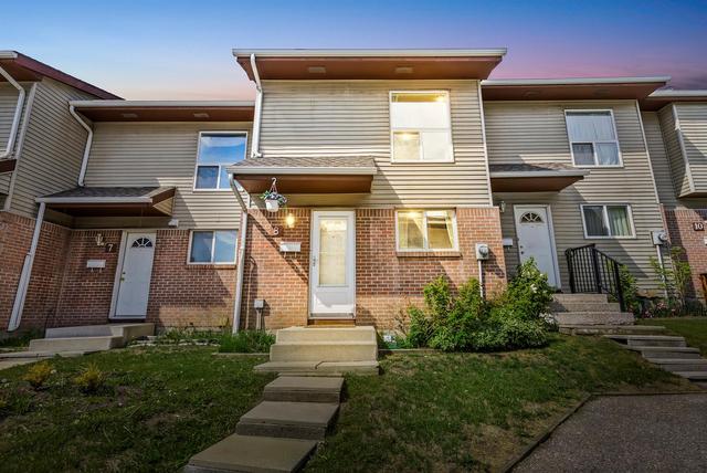 8 - 64 Whitnel Court Ne, Home with 2 bedrooms, 1 bathrooms and 1 parking in Calgary AB | Image 1