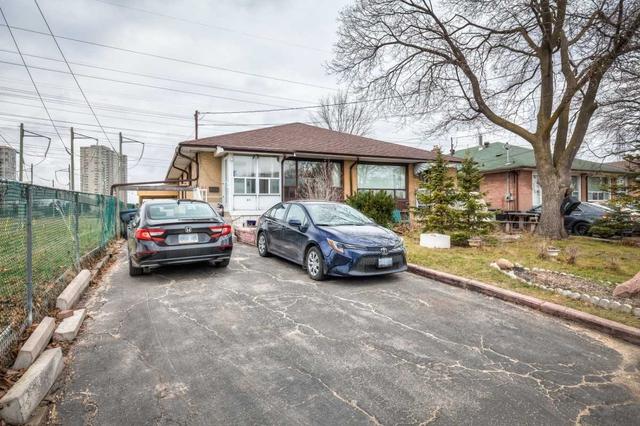 61 Virgilwood Dr, House semidetached with 4 bedrooms, 2 bathrooms and 4 parking in Toronto ON | Image 23