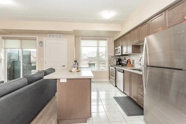 209 - 650 Sauve St, Condo with 1 bedrooms, 2 bathrooms and 1 parking in Milton ON | Image 9
