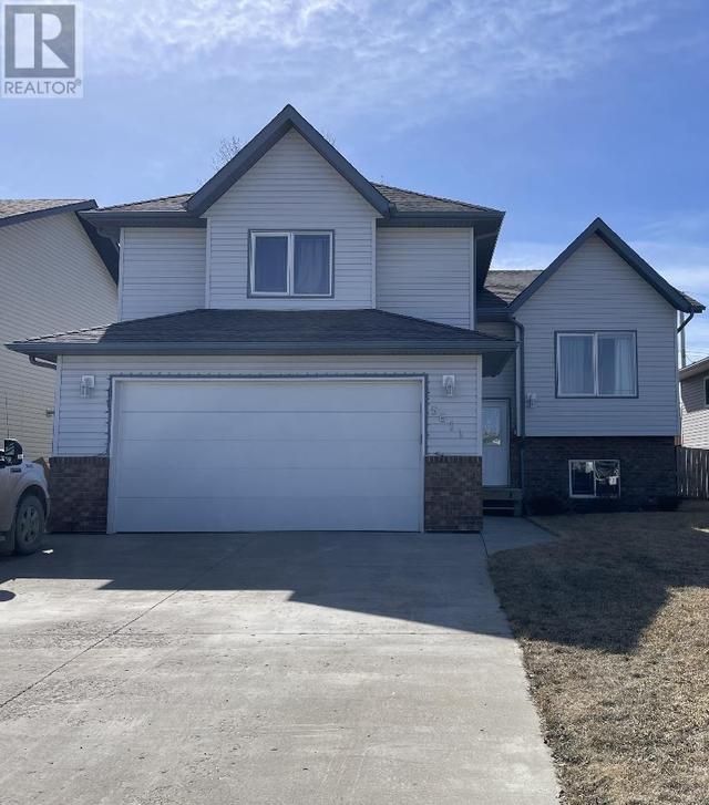 9611 113 Avenue, House detached with 4 bedrooms, 3 bathrooms and null parking in Fort St. John BC | Image 1