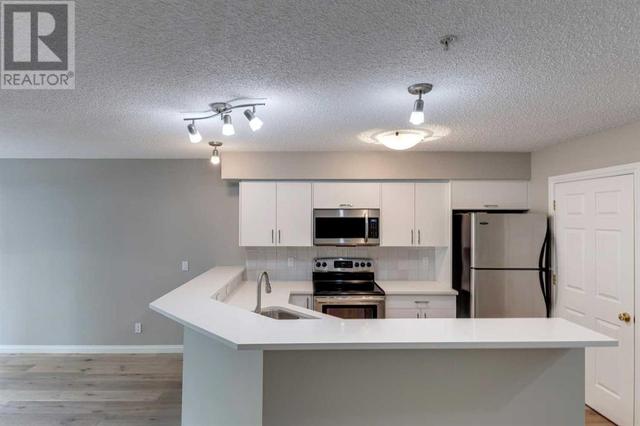 105, - 923 15 Avenue Sw, Condo with 2 bedrooms, 2 bathrooms and 1 parking in Calgary AB | Image 4