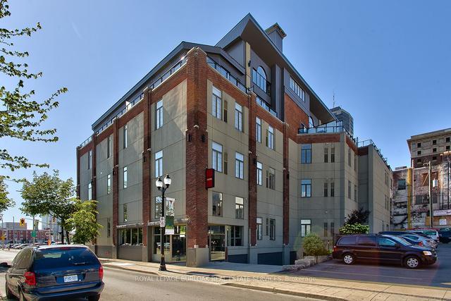 207 - 80 King William St, Condo with 2 bedrooms, 2 bathrooms and 1 parking in Hamilton ON | Image 1