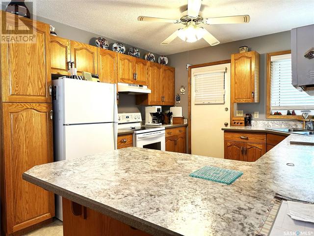 1005 6th Avenue, House attached with 2 bedrooms, 3 bathrooms and null parking in Humboldt SK | Image 12