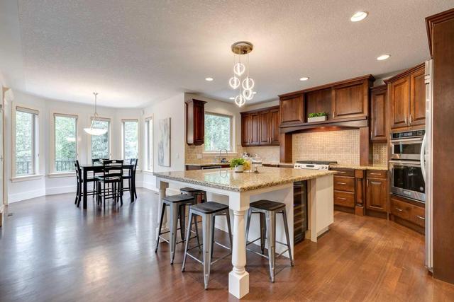 72 Discovery Valley Cove Sw, Home with 5 bedrooms, 5 bathrooms and 4 parking in Calgary AB | Image 11