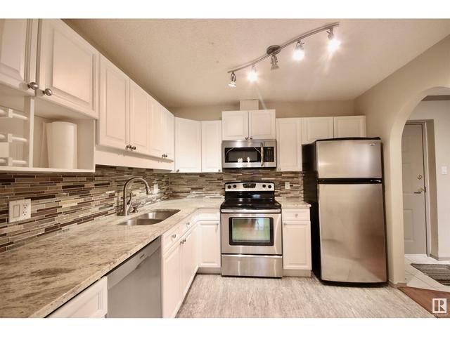 211 - 17151 94a Av Nw, Condo with 2 bedrooms, 2 bathrooms and 1 parking in Edmonton AB | Image 4