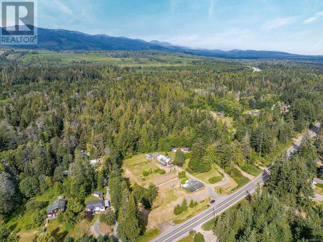 8185 Island Hwy S, House detached with 4 bedrooms, 4 bathrooms and 6 parking in Comox Valley A BC | Image 36