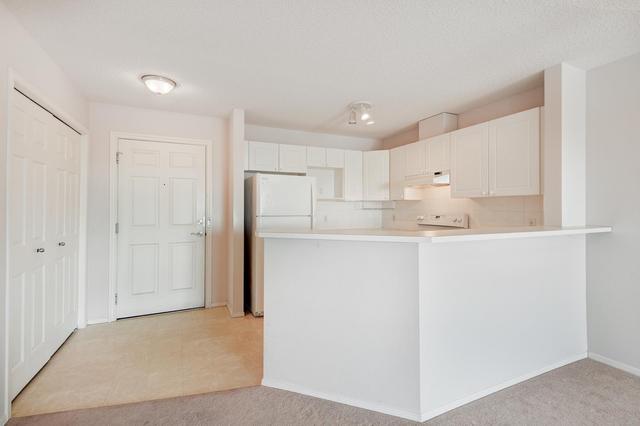 1304 - 950 Arbour Lake Road Nw, Condo with 2 bedrooms, 2 bathrooms and 1 parking in Calgary AB | Image 9