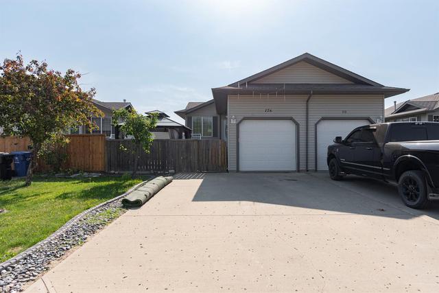 176 O'coffey Crescent, Home with 3 bedrooms, 2 bathrooms and 2 parking in Wood Buffalo AB | Image 1