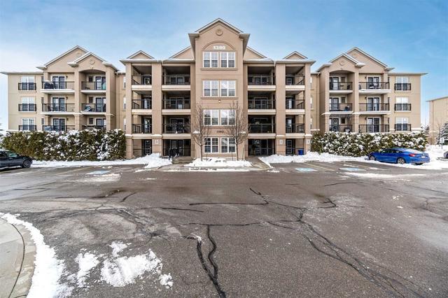 404 - 1390 Main St E, Condo with 1 bedrooms, 1 bathrooms and 1 parking in Milton ON | Image 1