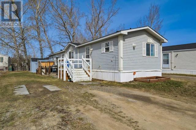103 Glasgow Street, Home with 3 bedrooms, 2 bathrooms and 2 parking in Foothills County AB | Image 2