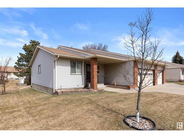 10640 153 Av Nw, House attached with 2 bedrooms, 1 bathrooms and 4 parking in Edmonton AB | Image 2