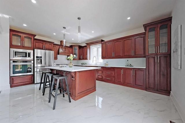18 Commonwealth Ave, House detached with 5 bedrooms, 5 bathrooms and 6 parking in Toronto ON | Image 6